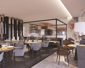 Ein Restaurant oder anderes Speiselokal in der Unterkunft Park Hyatt Jakarta 