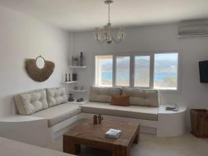A seating area at Voras Villa Panagia Beach
