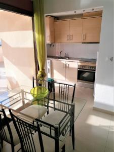 A kitchen or kitchenette at MH28 - 2 Bedroom apartment, stunning sea views, large terraces in Isla Plana, Puerto de Mazarron