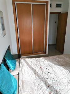 A bed or beds in a room at MH28 - 2 Bedroom apartment, stunning sea views, large terraces in Isla Plana, Puerto de Mazarron