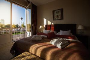 Postel nebo postele na pokoji v ubytování Hotel Devín
