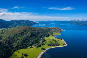 an island in the middle of a body of water at Outlander Glencoe at Creag an-t Sionnaich Glencoe Ballachulish Highlands Near Fort William in Glencoe