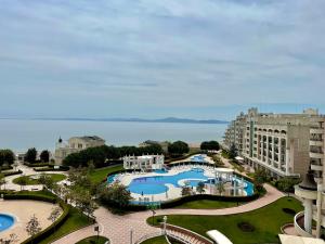 an aerial view of a resort with two pools at Apartment Sunset Resort in Pomorie