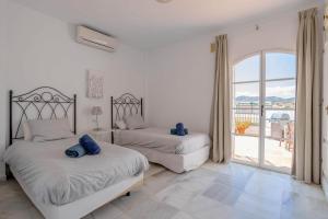 Posteľ alebo postele v izbe v ubytovaní Casa Verkath-playa Burriana