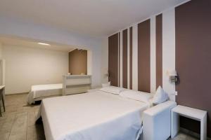 Postel nebo postele na pokoji v ubytování Hotel Saviola