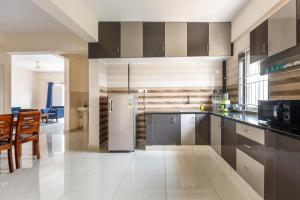 Kuchyňa alebo kuchynka v ubytovaní Pinnacle Serviced Apartments