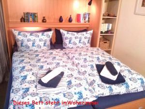 Postel nebo postele na pokoji v ubytování Ferienwohnungen Schulte
