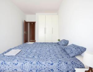 Posteľ alebo postele v izbe v ubytovaní Waw Apartamenty Wilanów Branickiego