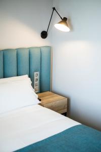Hotel Voramar客房内的一张或多张床位