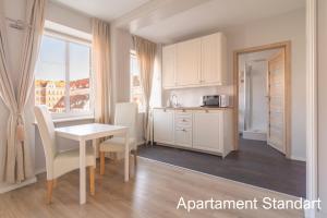 Nhà bếp/bếp nhỏ tại Apartamenty nad Motławą