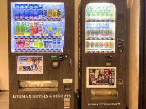 a vending machine with drinks and drinks on it at HOTEL LiVEMAX Takamatsu Eki Mae in Takamatsu
