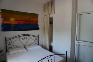 Ένα ή περισσότερα κρεβάτια σε δωμάτιο στο Bivilla Incalzi
