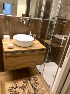 A bathroom at Novella Suite Még 31 kép