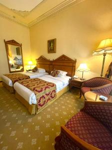 Voodi või voodid majutusasutuse Serenada Golden Palace - Boutique Hotel toas
