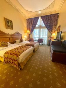 Voodi või voodid majutusasutuse Serenada Golden Palace - Boutique Hotel toas