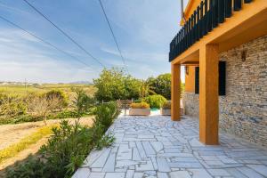 a stone walkway in front of a house at Kochab Sintra by LovelyStay in Sintra