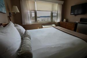 Voodi või voodid majutusasutuse Inn on the Hudson toas