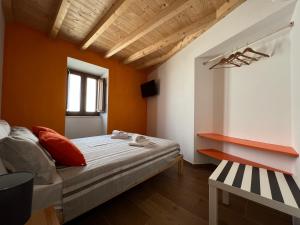 Un pat sau paturi într-o cameră la Casa Arenga