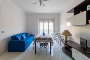 Posedenie v ubytovaní Appartamento vicino al mare