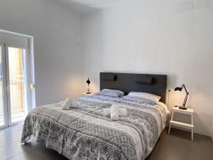 Posteľ alebo postele v izbe v ubytovaní Casa San Juan 13 Casasol Centro