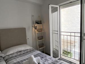 Posteľ alebo postele v izbe v ubytovaní Casa San Juan 13 Casasol Centro