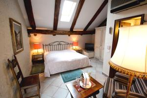 Voodi või voodid majutusasutuse Romantik Hotel Castello Seeschloss toas
