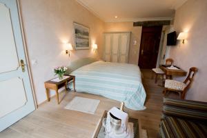 Voodi või voodid majutusasutuse Romantik Hotel Castello Seeschloss toas