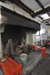 Posedenie v ubytovaní Antica casa colonica in pietra in Toscana