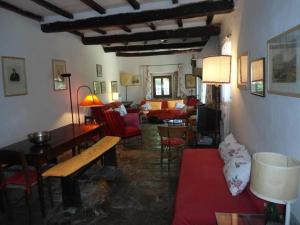 Posedenie v ubytovaní Antica casa colonica in pietra in Toscana