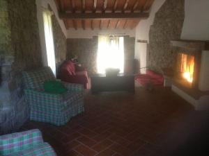 Posedenie v ubytovaní Antica casa colonica in pietra in Toscana