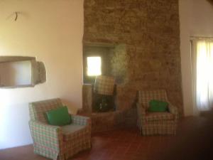 Posedenie v ubytovaní Antica casa colonica in pietra in Toscana