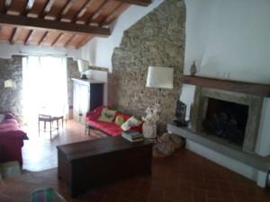Posedenie v ubytovaní Antica casa colonica in pietra in Toscana