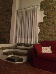 Posedenie v ubytovaní Antica casa colonica in pietra in Toscana