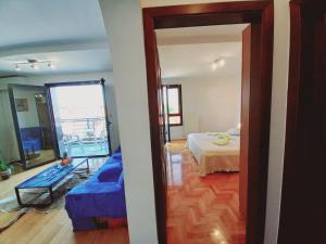Łóżko lub łóżka w pokoju w obiekcie Iva apartman