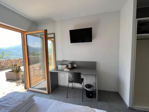 A television and/or entertainment centre at Agriturismo Margone
