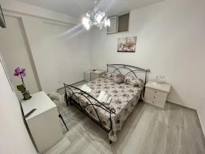 Postel nebo postele na pokoji v ubytování Donnabella house