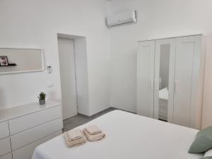 Posteľ alebo postele v izbe v ubytovaní A Casa di Papà by Holiday World