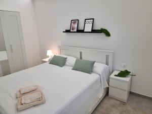 Posteľ alebo postele v izbe v ubytovaní A Casa di Papà by Holiday World