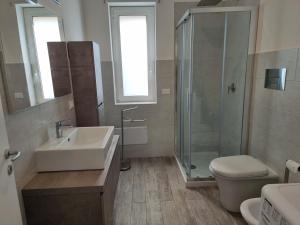 Kúpeľňa v ubytovaní A Casa di Papà by Holiday World + 23 fotografií