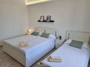 Posteľ alebo postele v izbe v ubytovaní A Casa di Papà by Holiday World