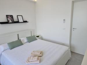 Posteľ alebo postele v izbe v ubytovaní A Casa di Papà by Holiday World