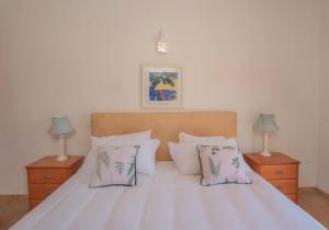 En eller flere senge i et værelse på Villa Acacias 18, Brisa do Mar + 17 billeder