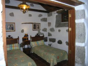 Postel nebo postele na pokoji v ubytování Vivelorural - La Casita de Andrés 1 en Agüimes