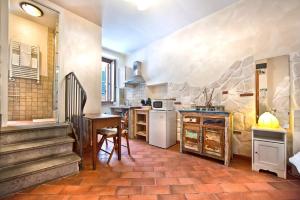 Una cocina o cocineta en Il Raduno