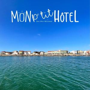 a picture of the water with the words monofi hotel at Mon P'tit Hôtel in Le Grau-dʼAgde