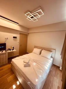 Giường trong phòng chung tại CentralViewSuites