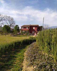 Vrt pred nastanitvijo B&B Le Stagioni