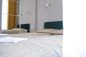 Łóżko lub łóżka w pokoju w obiekcie Glamorous Apartment Old Town Cracow