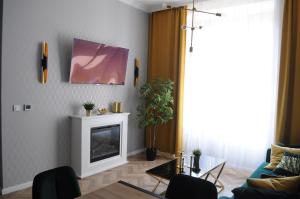 Telewizja i/lub zestaw kina domowego w obiekcie Glamorous Apartment Old Town Cracow