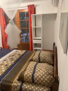 Ένα ή περισσότερα κρεβάτια σε δωμάτιο στο Studio Anse L'Etang +11 φωτογραφίες